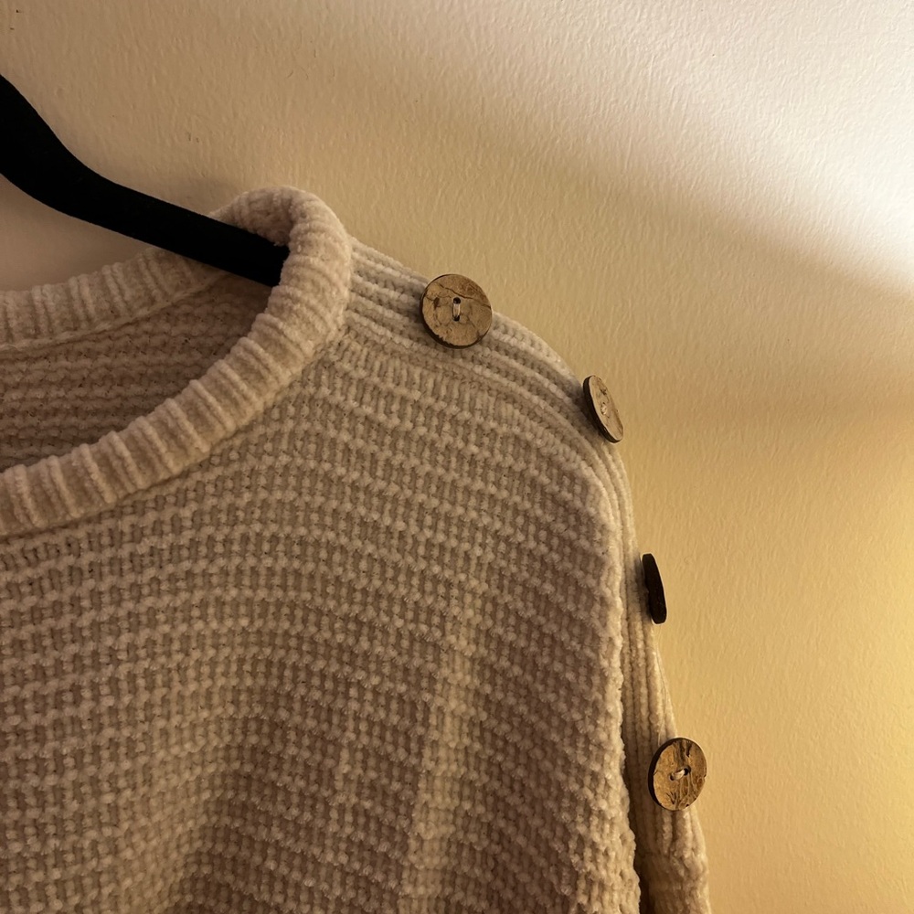 Poof Apparel semi-cropped cream sweater with button details